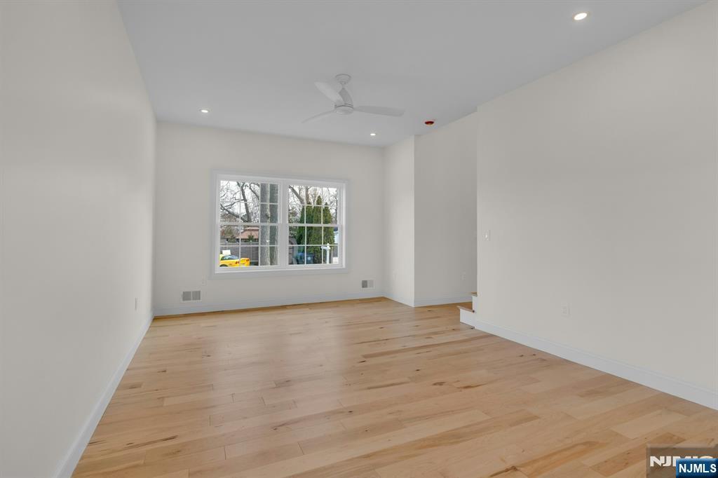 2127 Locust Road Sea Girt, NJ 08750 - Photo 15 of 48 wooden floor in an empty room with a window