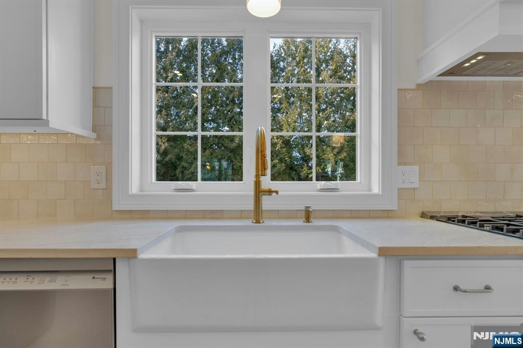 2127 Locust Road Sea Girt, NJ 08750 - Photo 20 of 48 a bathroom with a sink and a bathtub