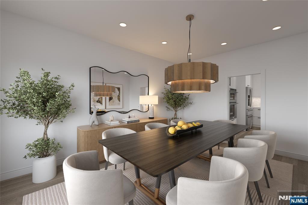 2127 Locust Road Sea Girt, NJ 08750 - Photo 22 of 48 a kitchen with a table and chairs