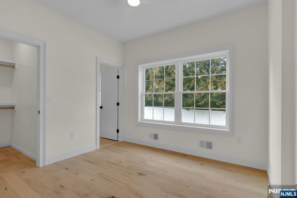 2127 Locust Road Sea Girt, NJ 08750 - Photo 26 of 48 an empty room with a window