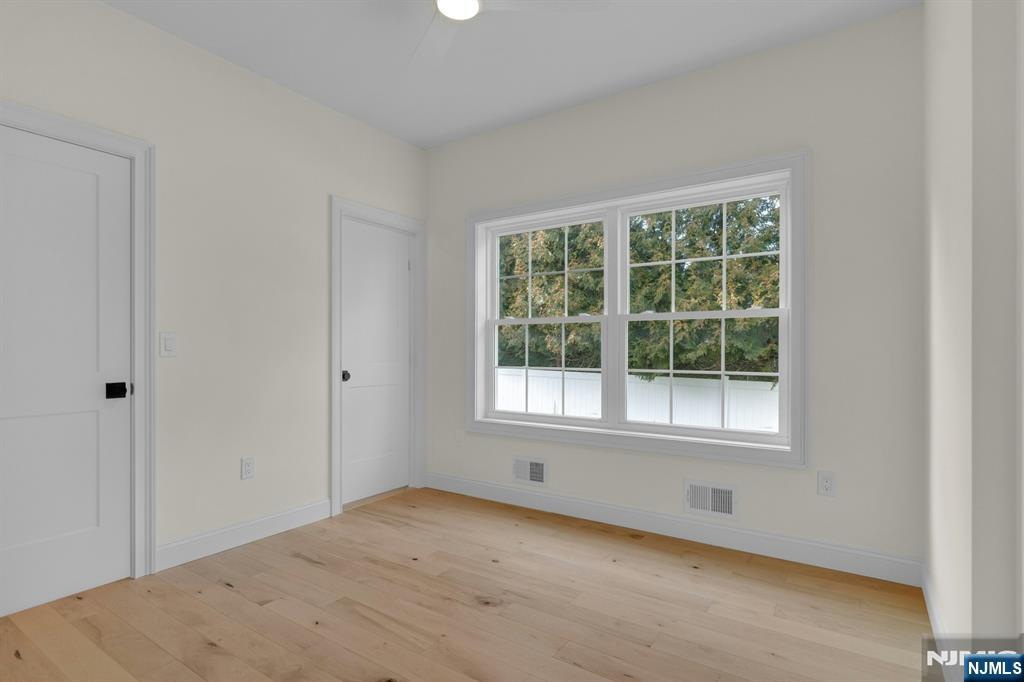 2127 Locust Road Sea Girt, NJ 08750 - Photo 27 of 48 an empty room with a window