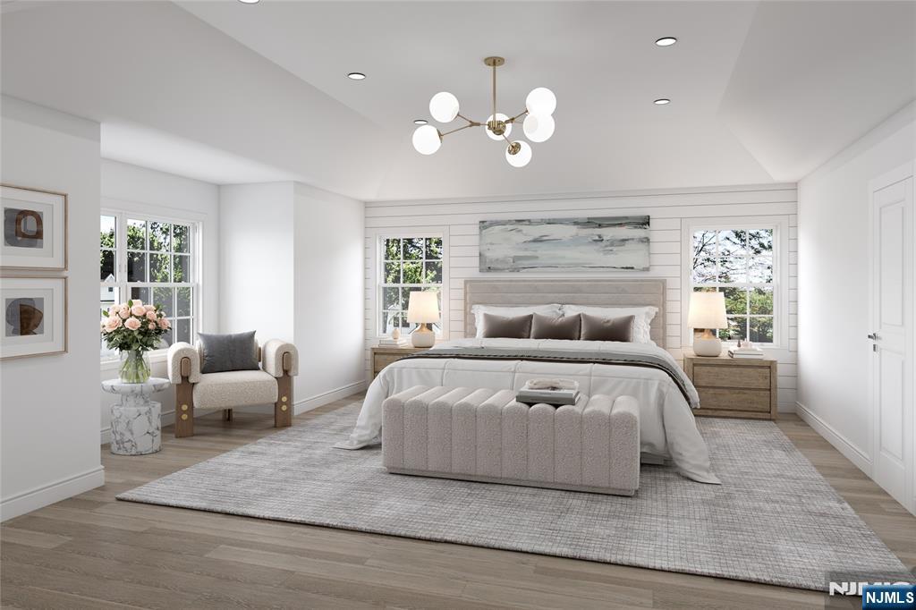 2127 Locust Road Sea Girt, NJ 08750 - Photo 29 of 48 a bedroom with a large bed mirror and couch