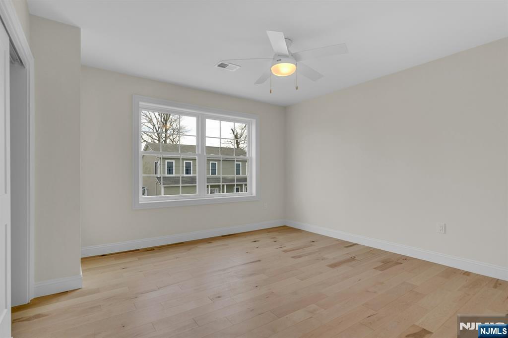 2127 Locust Road Sea Girt, NJ 08750 - Photo 37 of 48 an empty room with windows