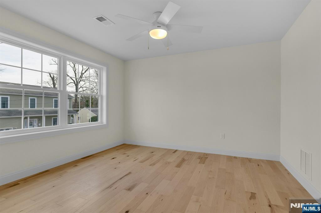 2127 Locust Road Sea Girt, NJ 08750 - Photo 38 of 48 an empty room with a window