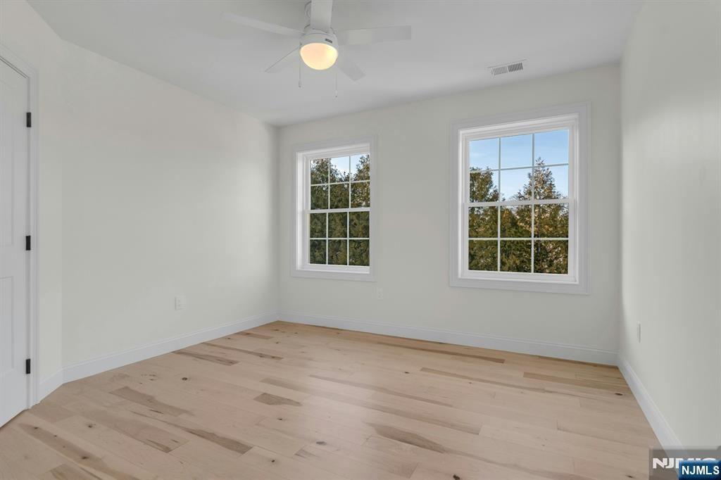 2127 Locust Road Sea Girt, NJ 08750 - Photo 41 of 48 an empty room with windows