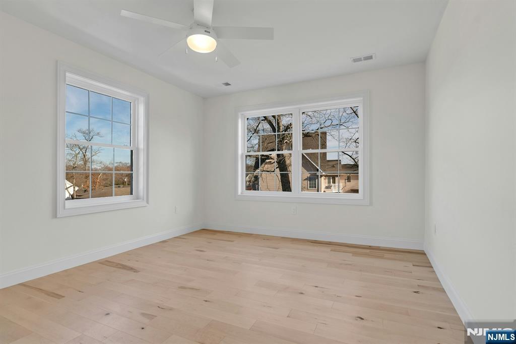 2127 Locust Road Sea Girt, NJ 08750 - Photo 42 of 48 an empty room with windows
