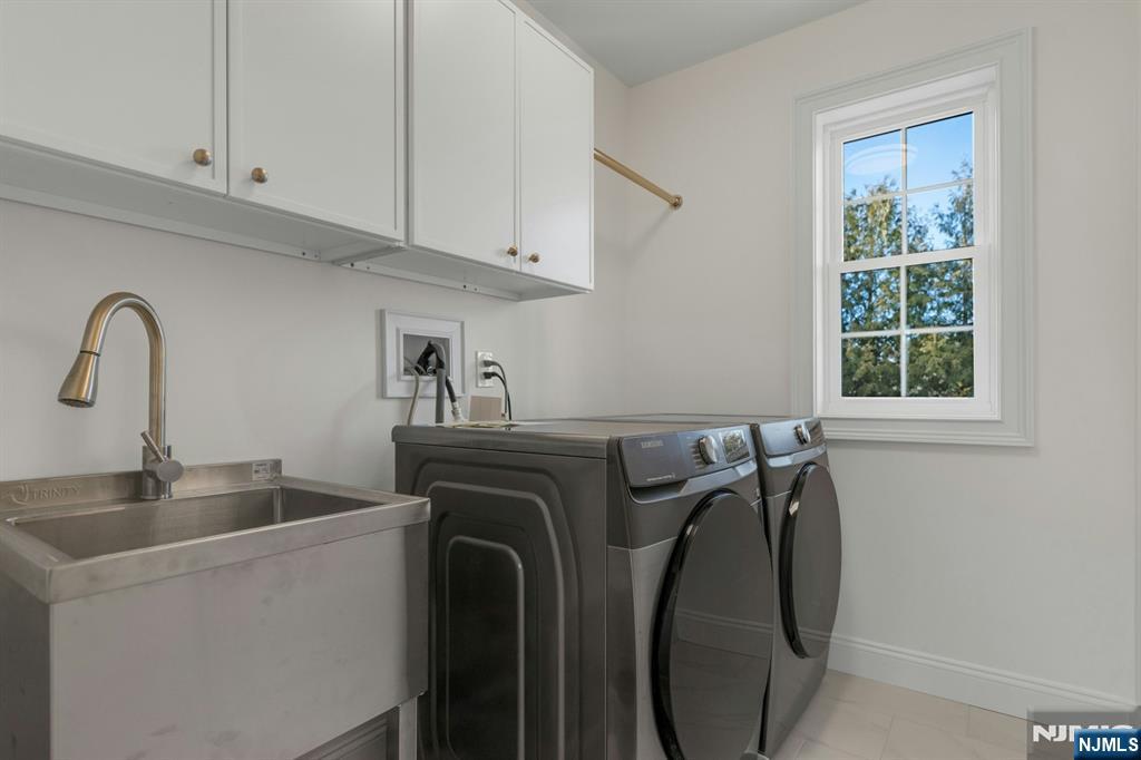 2127 Locust Road Sea Girt, NJ 08750 - Photo 43 of 48 a utility room with dryer and washer