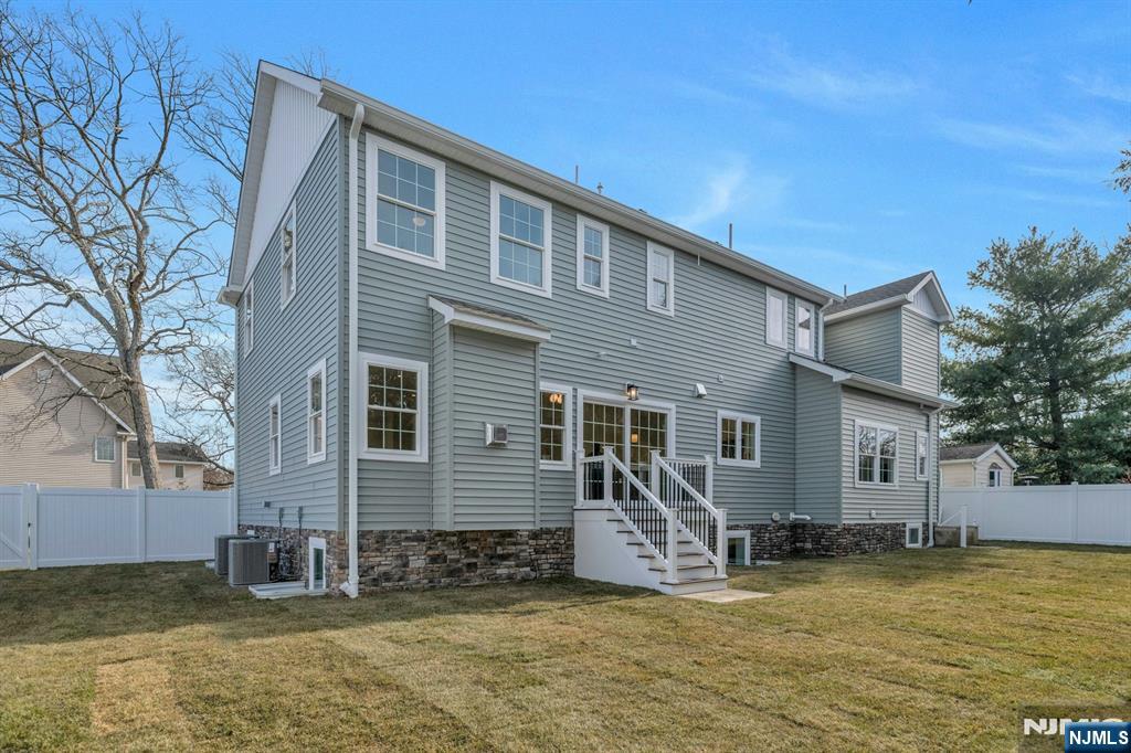2127 Locust Road Sea Girt, NJ 08750 - Photo 48 of 48 a front view of a house with a yard