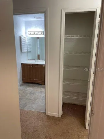 view of hall way with mirror