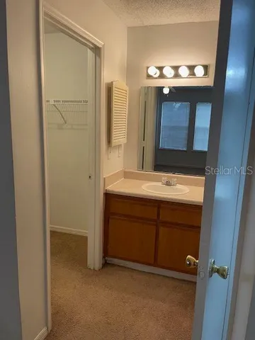 an empty room with a bathroom