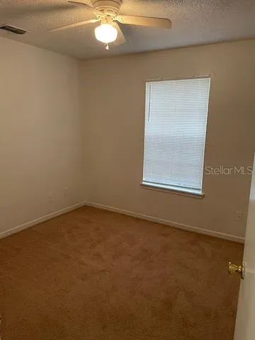 a view of backyard door and porch