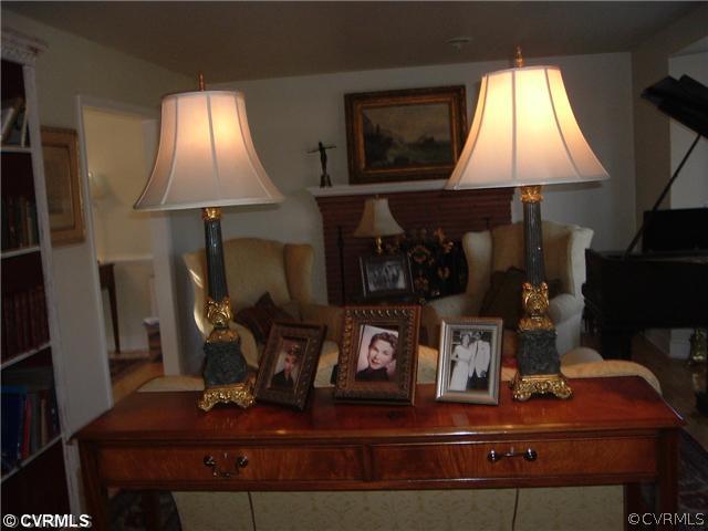 301 Wilkinson Road Richmond, VA 23227 - Photo 3 of 16 a room with table and chairs