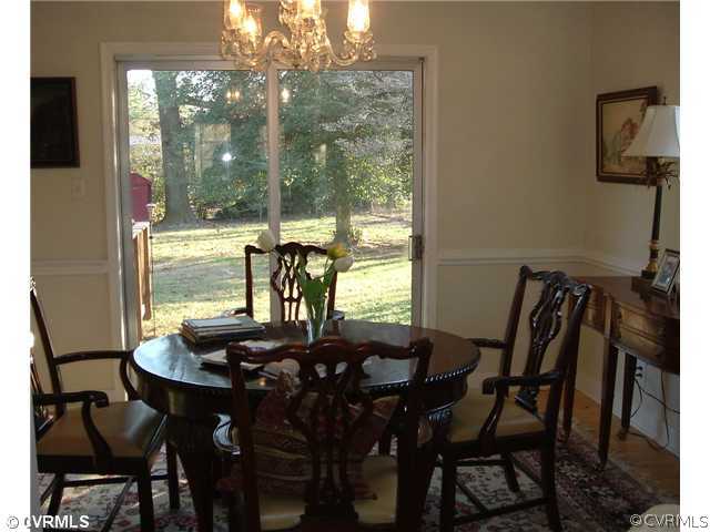 301 Wilkinson Road Richmond, VA 23227 - Photo 8 of 16 a view of a dining room with furniture and window