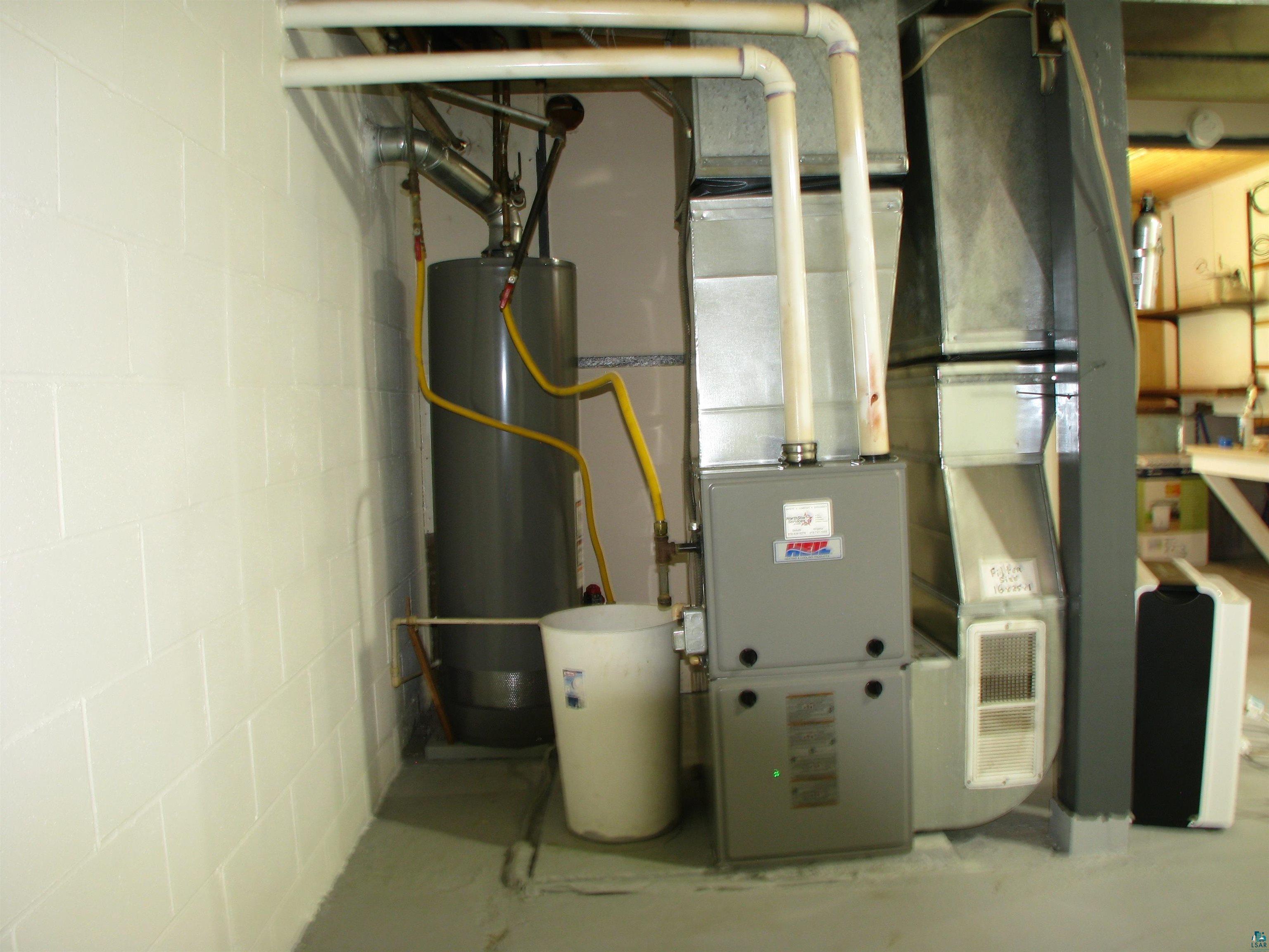 4179 Willard Road Rice Lake, MN 55803 - Photo 19 of 39 Utility room featuring gas water heater