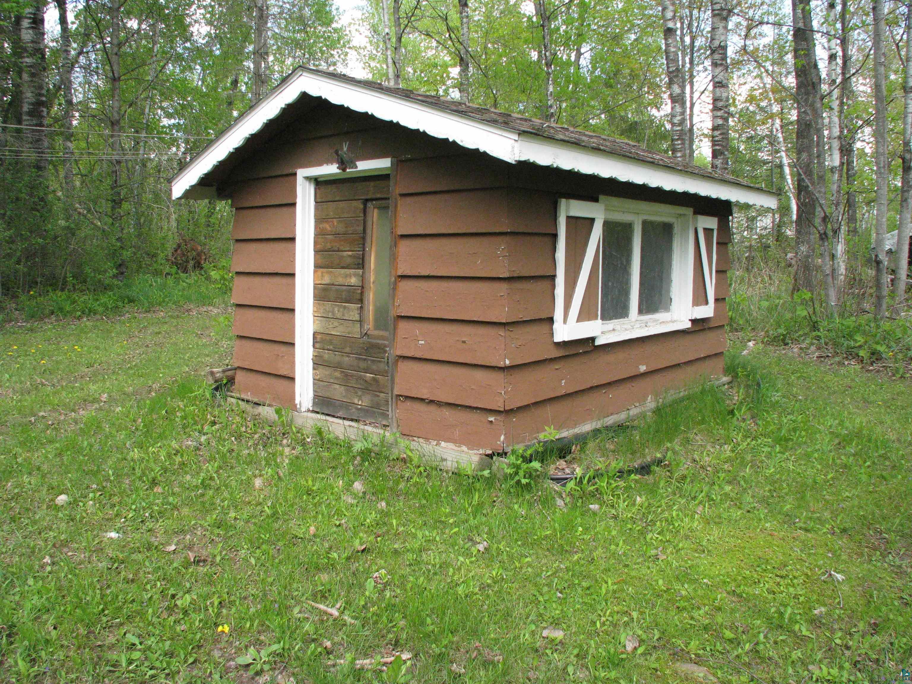 4179 Willard Road Rice Lake, MN 55803 - Photo 30 of 39 View of outdoor structure featuring a yard