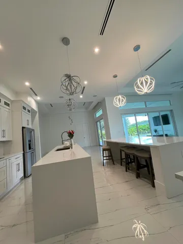 a room with furniture and a large window