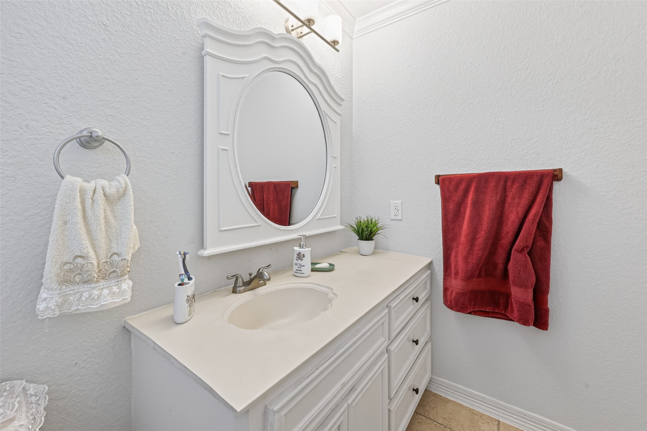 8023 Pool Hill Road Fulshear, TX 77441 - Photo 41 of 50 a bathroom with a sink vanity and mirror
