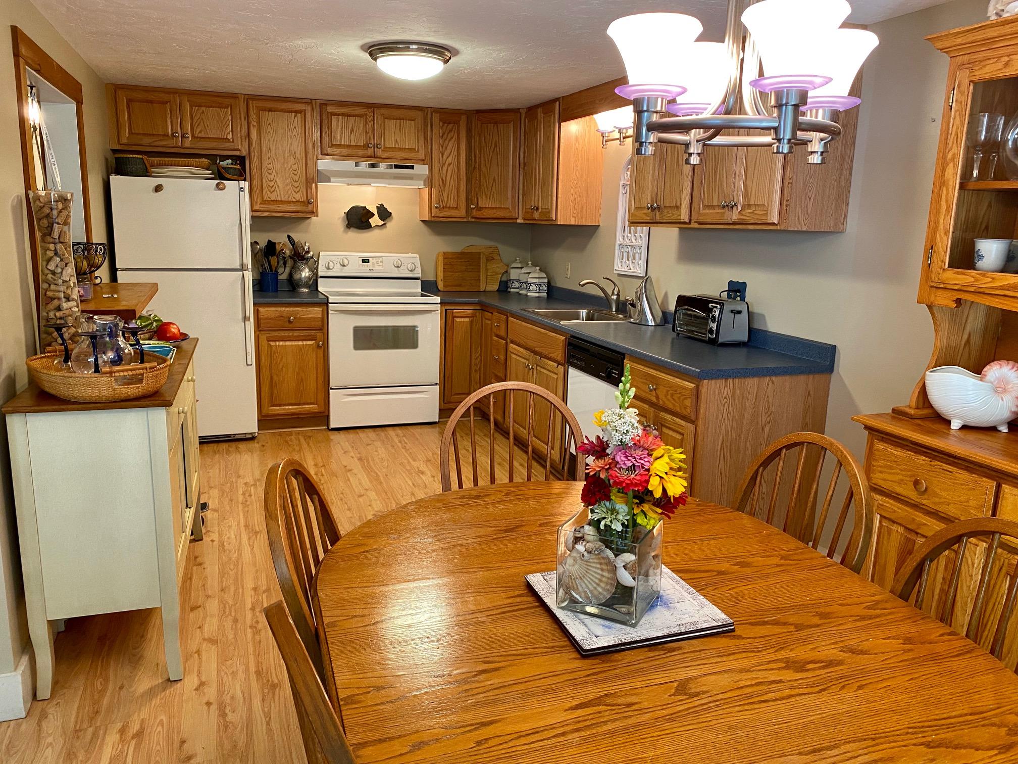 116 Trout Brook Road Cotuit, MA 02635 - Photo 10 of 36 Dining into Kitchen