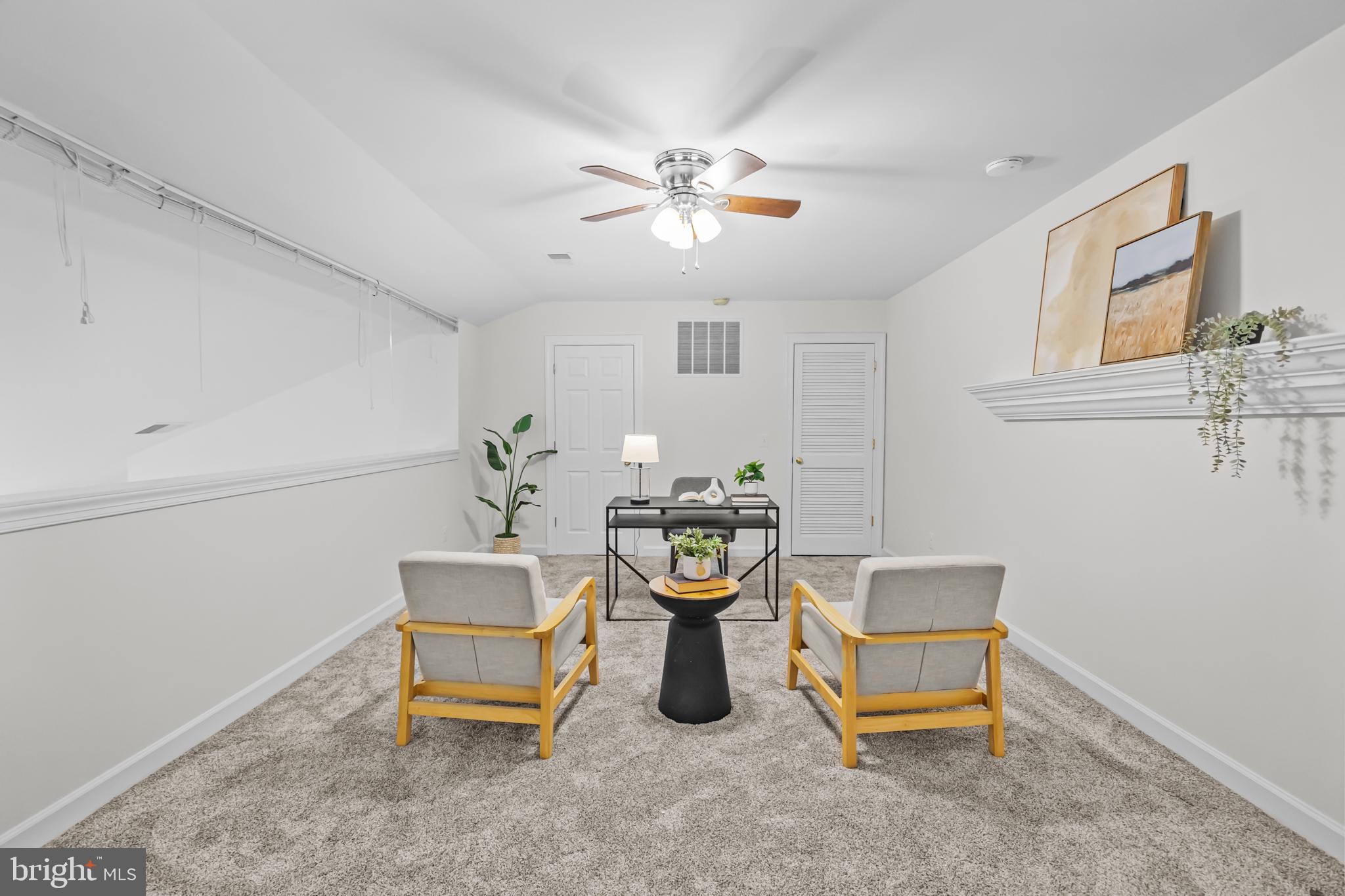 17045 Islip Loop, Unit 303 Dumfries, VA 22026 - Photo 28 of 48 a living room with furniture