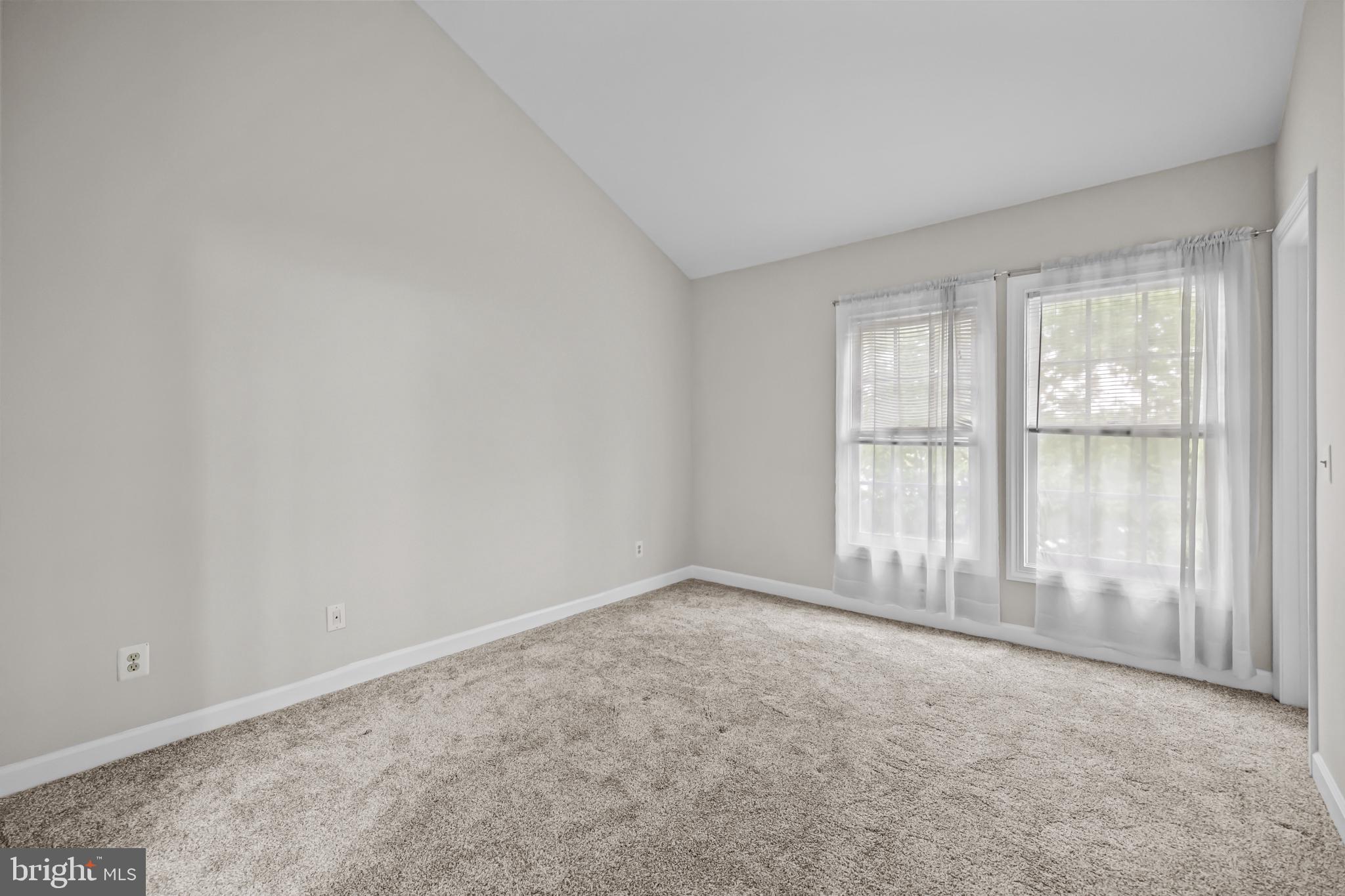 17045 Islip Loop, Unit 303 Dumfries, VA 22026 - Photo 34 of 48 an empty room with windows
