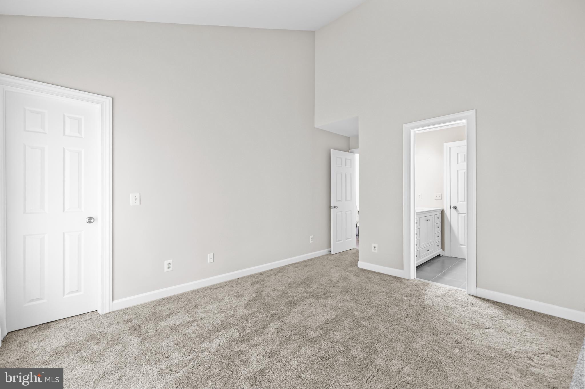 17045 Islip Loop, Unit 303 Dumfries, VA 22026 - Photo 35 of 48 a view of an empty room and closet area