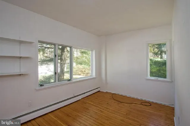 a view of a room that has a window in it