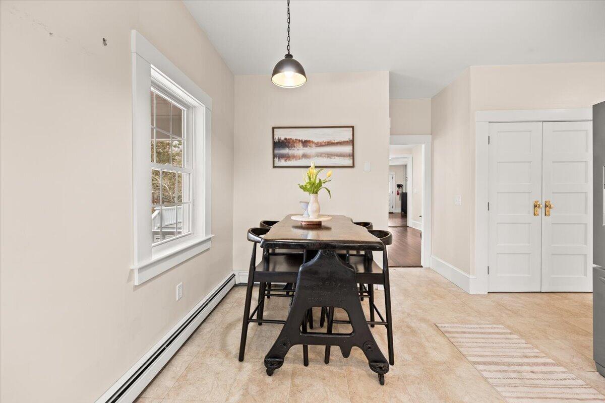 729 Center Street Dighton, MA 02764 - Photo 14 of 62 a view of a dining room with furniture and window
