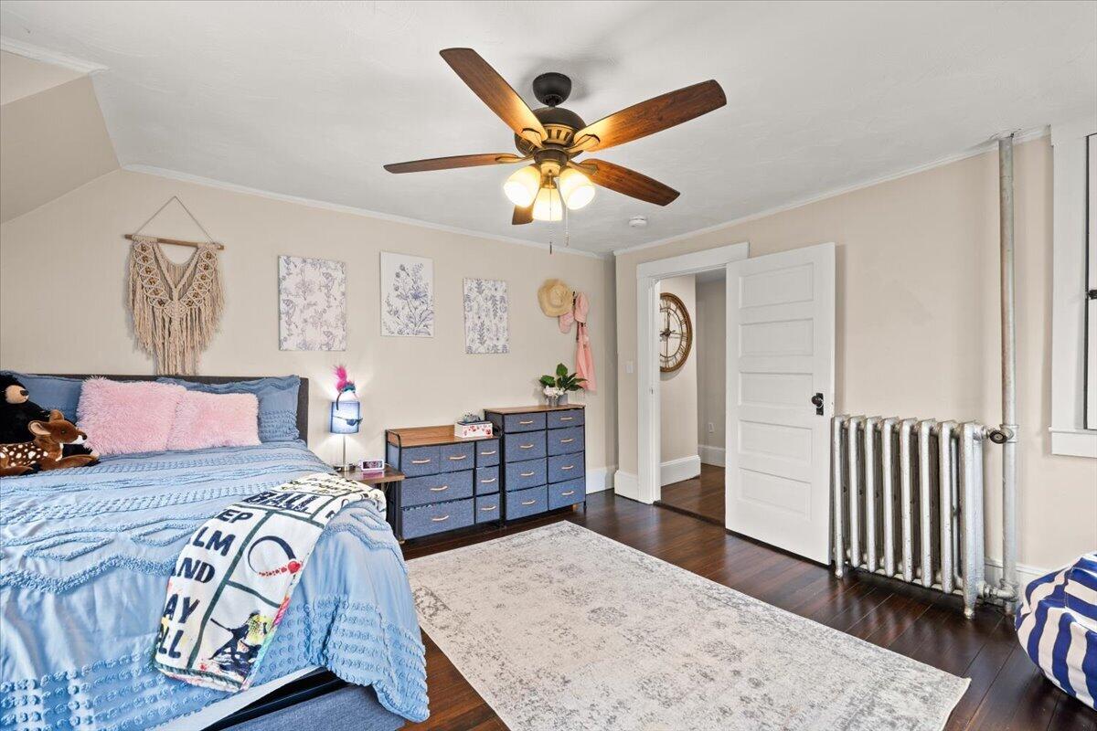 729 Center Street Dighton, MA 02764 - Photo 24 of 62 a bedroom with a bed and a dresser