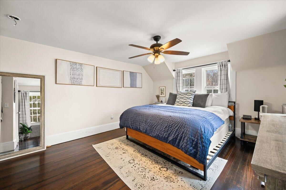 729 Center Street Dighton, MA 02764 - Photo 30 of 62 a bedroom with a large bed a chandelier and a window