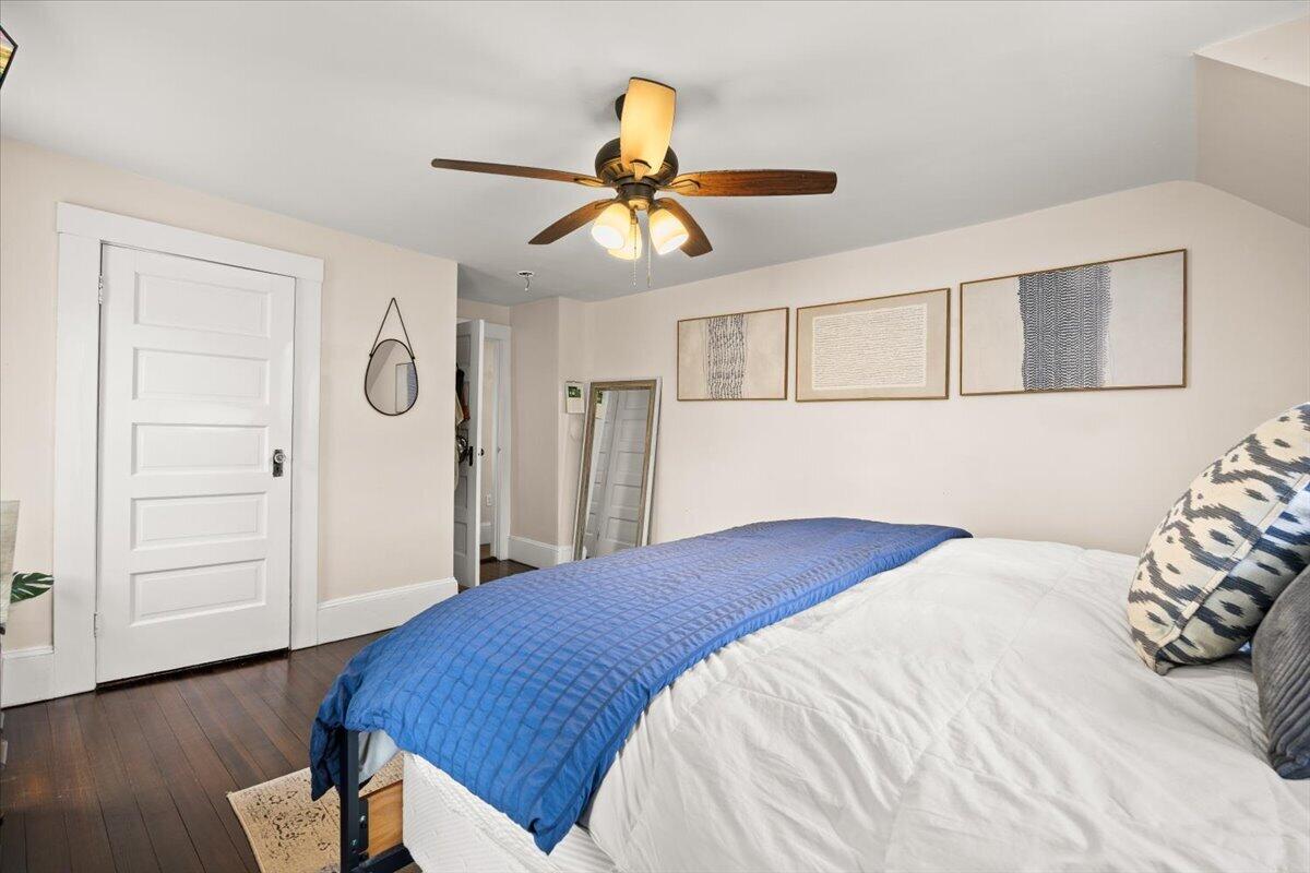 729 Center Street Dighton, MA 02764 - Photo 31 of 62 a bedroom with a bed and wooden floor