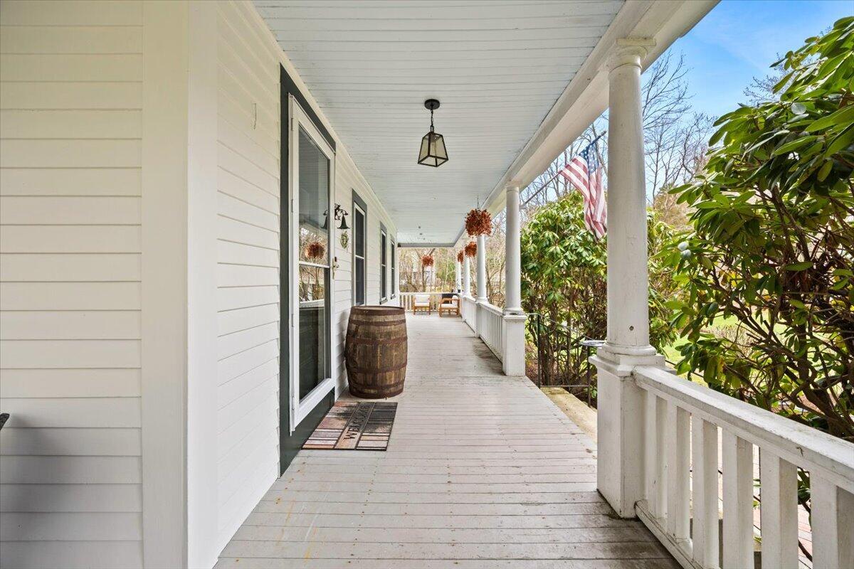 729 Center Street Dighton, MA 02764 - Photo 33 of 62 a view of a hallway with wooden floor and staircase