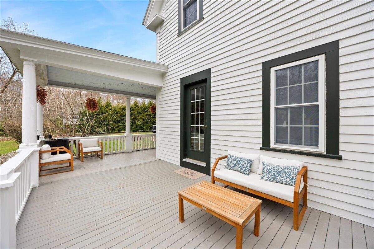 729 Center Street Dighton, MA 02764 - Photo 34 of 62 a backyard of a house with wooden floor and outdoor seating
