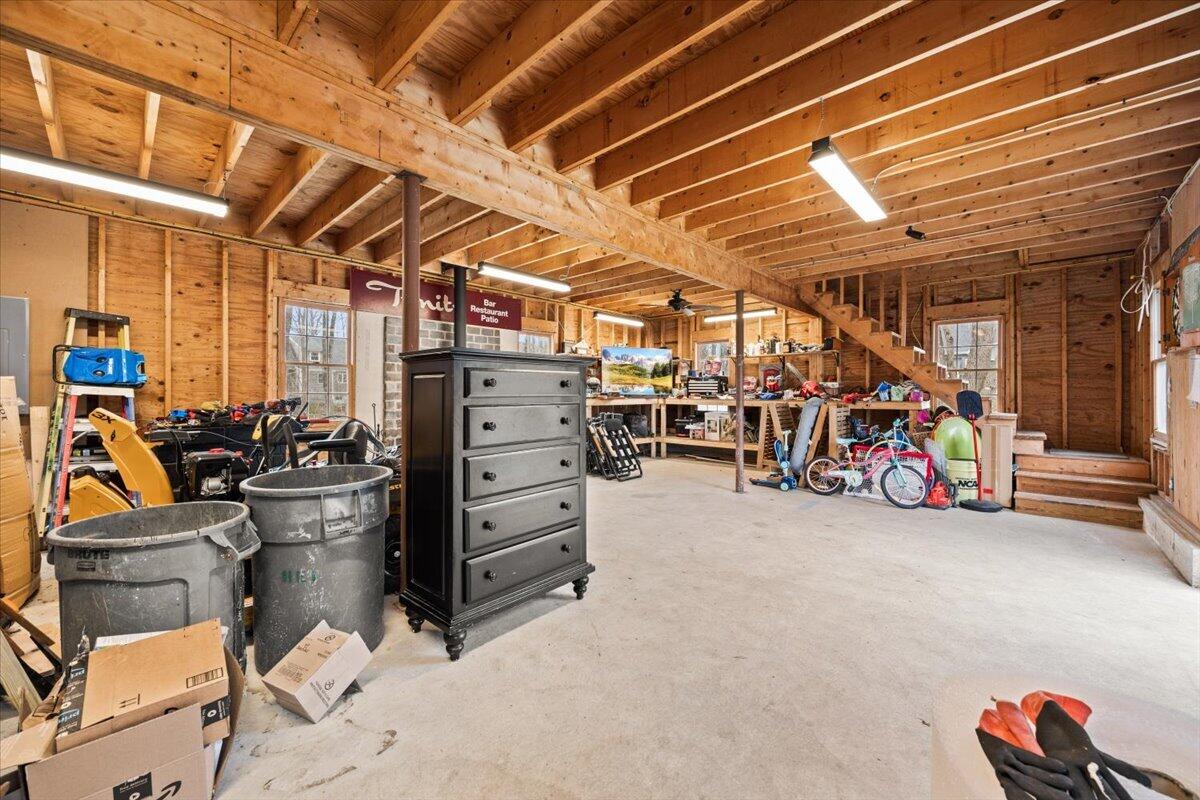 729 Center Street Dighton, MA 02764 - Photo 36 of 62 a view of a storage room with shelves