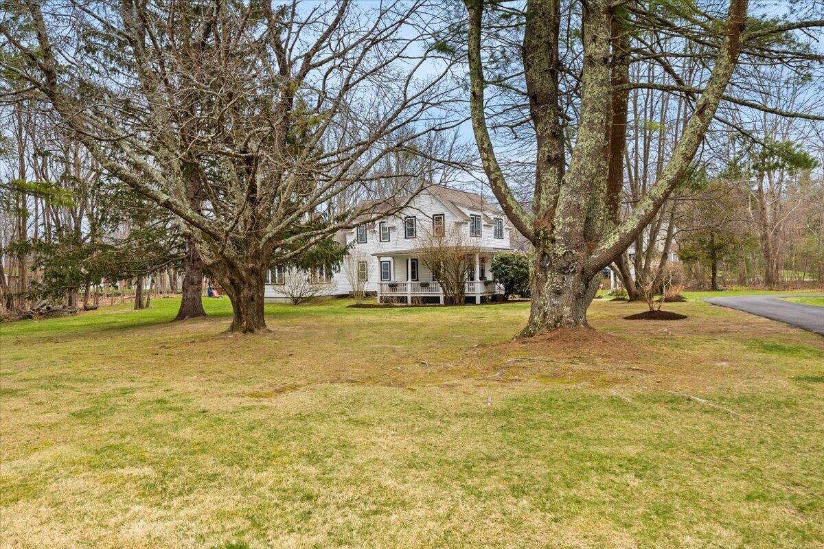 729 Center Street Dighton, MA 02764 - Photo 49 of 62 a front view of a house with a yard and trees