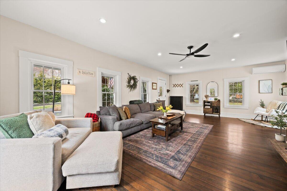729 Center Street Dighton, MA 02764 - Photo 5 of 62 a living room with furniture or couch and a wooden floor
