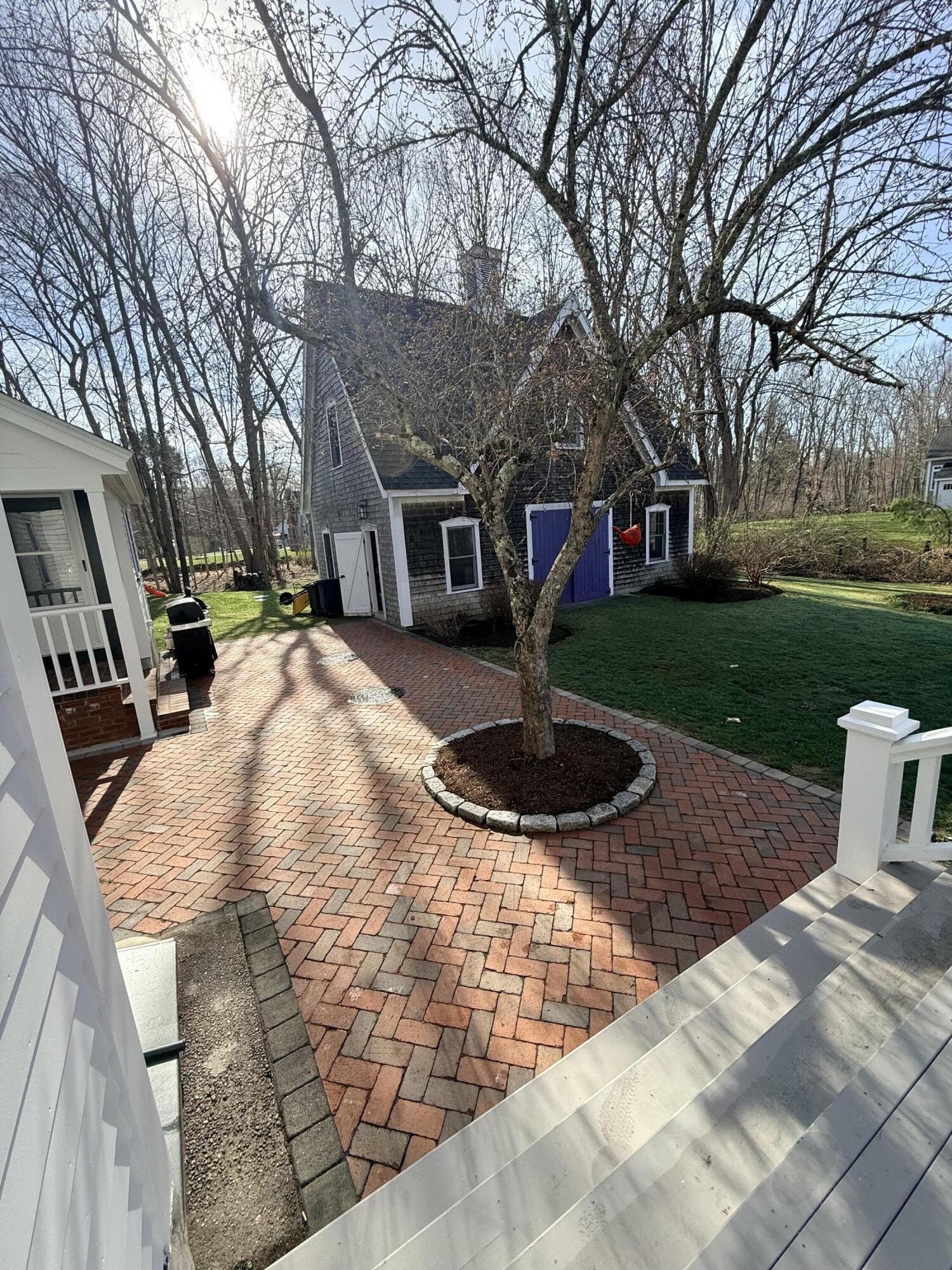 729 Center Street Dighton, MA 02764 - Photo 54 of 62 a front view of a house with garden and trees