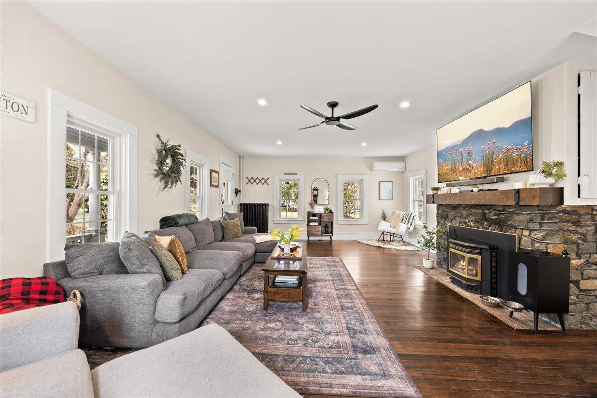 729 Center Street Dighton, MA 02764 - Photo 6 of 62 a living room with furniture and a fireplace