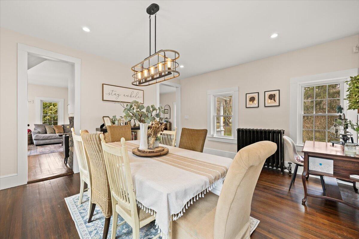 729 Center Street Dighton, MA 02764 - Photo 8 of 62 a view of a dining room with furniture wooden floor and chandelier