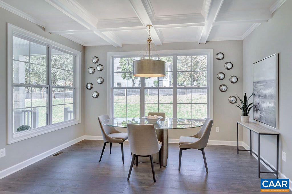 106 C Cliffstone Boulevard Charlottesville, VA 22911 - Photo 10 of 37 a view of a dining room with furniture window and wooden floor