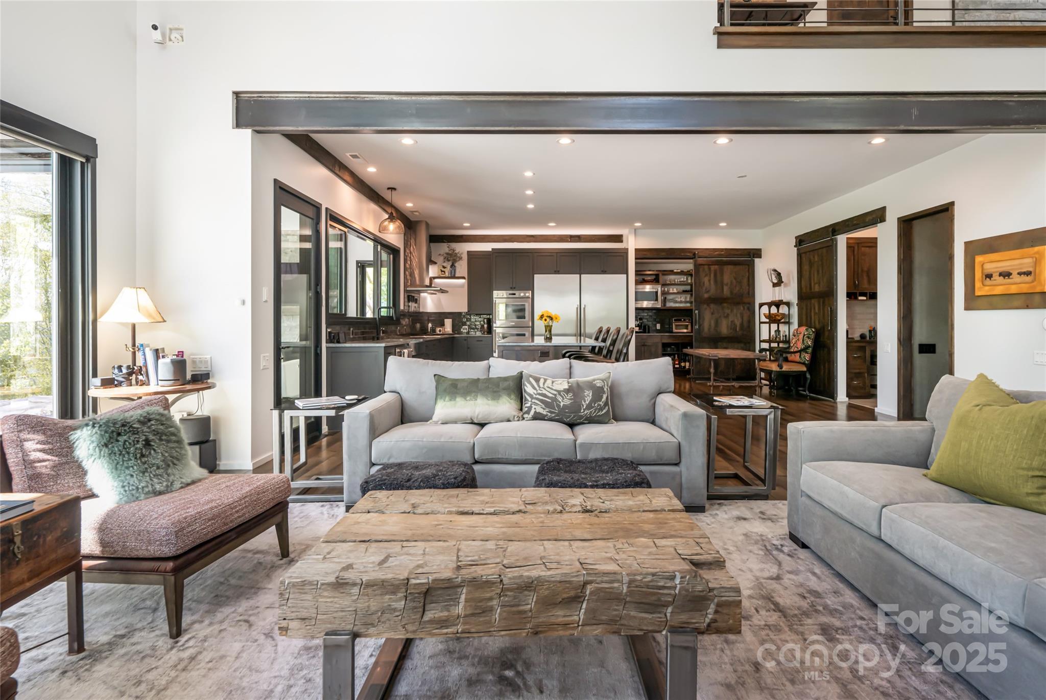 94 Laurel Ledge Way Fletcher, NC 28732 - Photo 11 of 48 a living room with furniture and a large window