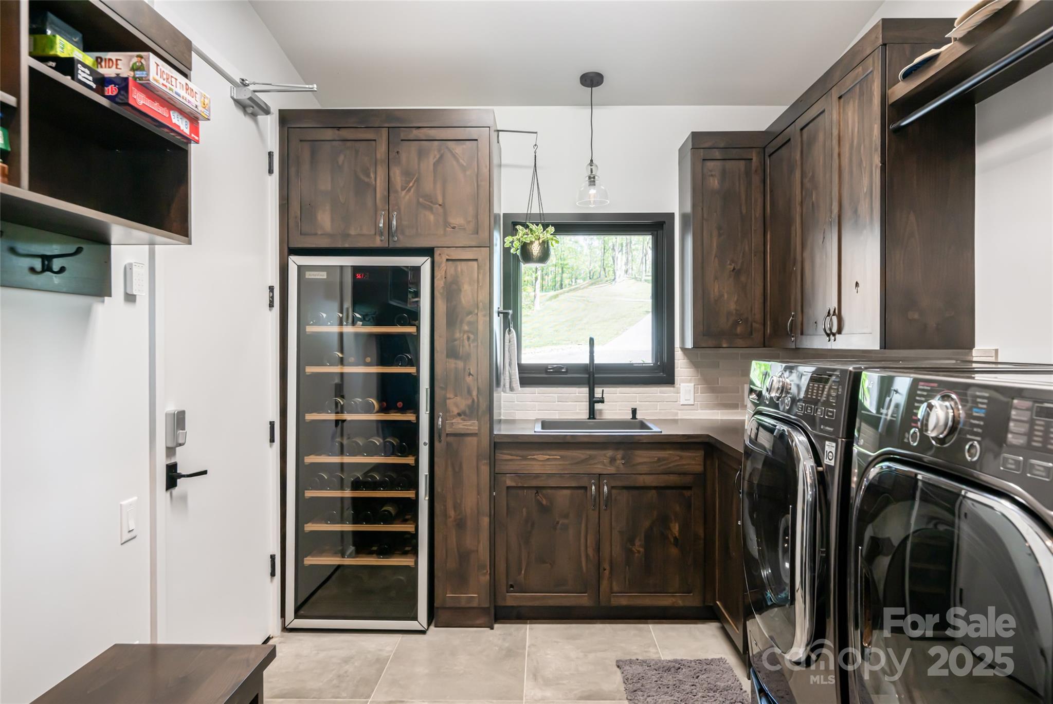 94 Laurel Ledge Way Fletcher, NC 28732 - Photo 22 of 48 a kitchen with refrigerator and cabinets