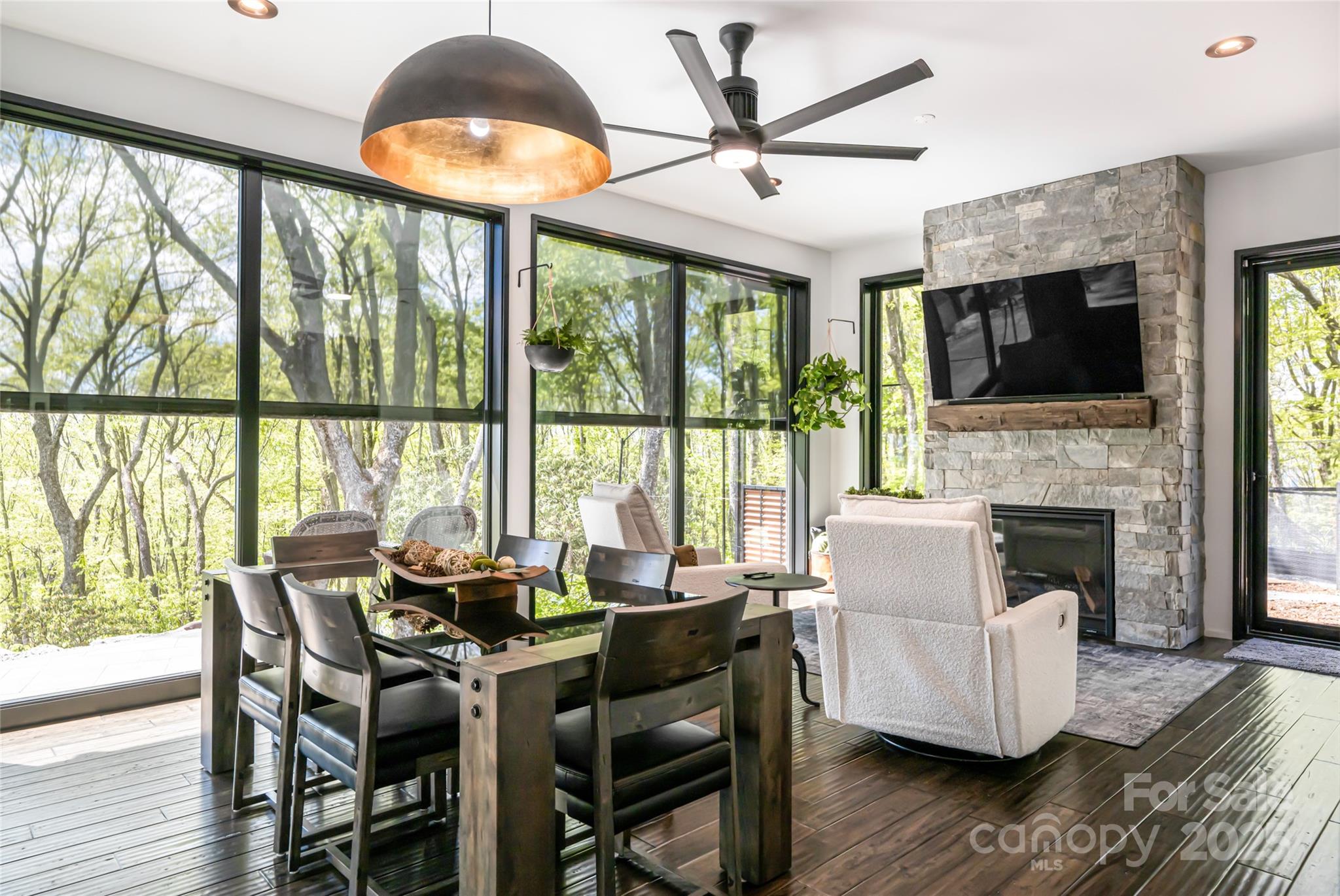 94 Laurel Ledge Way Fletcher, NC 28732 - Photo 25 of 48 a living room with fireplace furniture and a flat screen tv