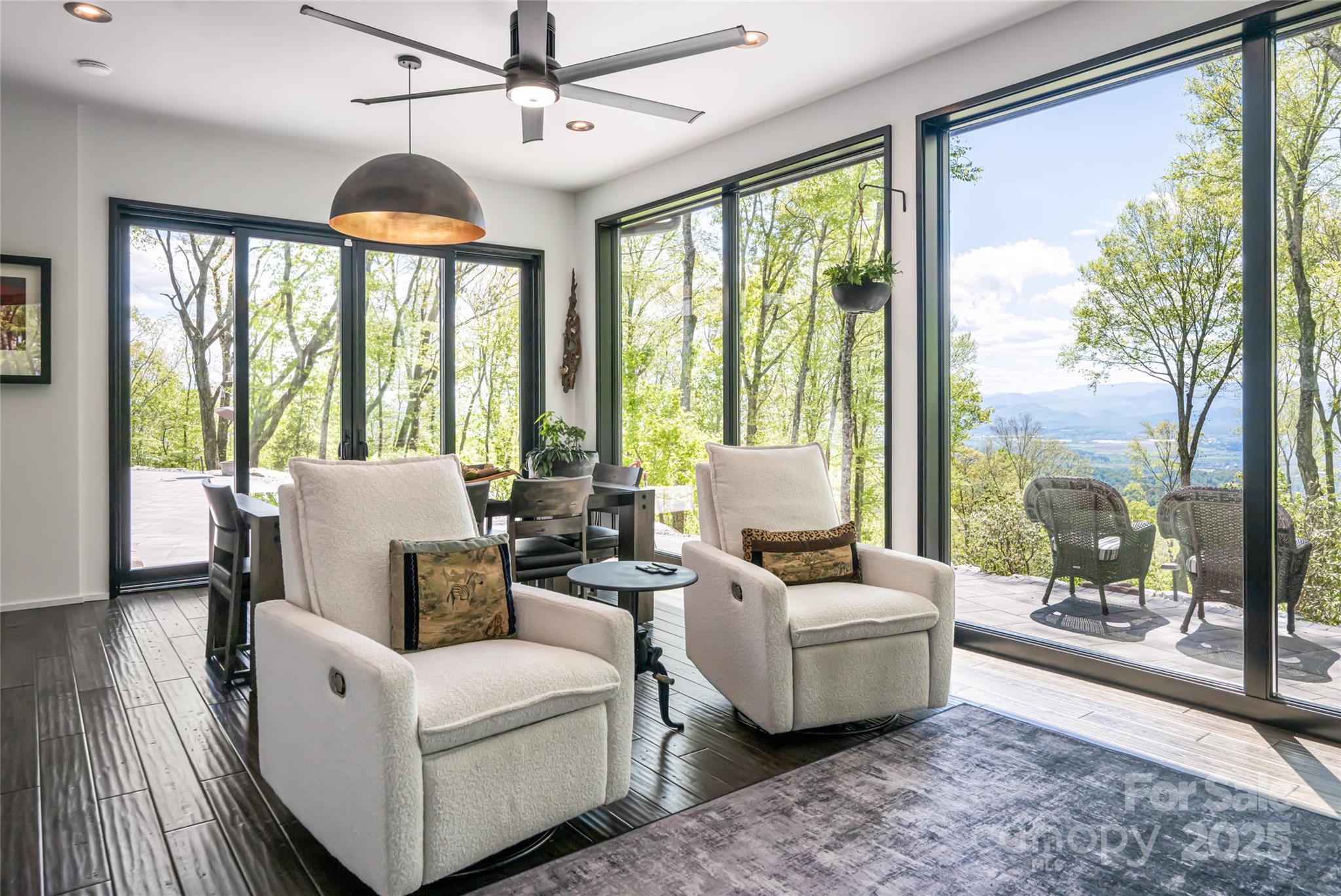 94 Laurel Ledge Way Fletcher, NC 28732 - Photo 27 of 48 a living room with furniture and a large window