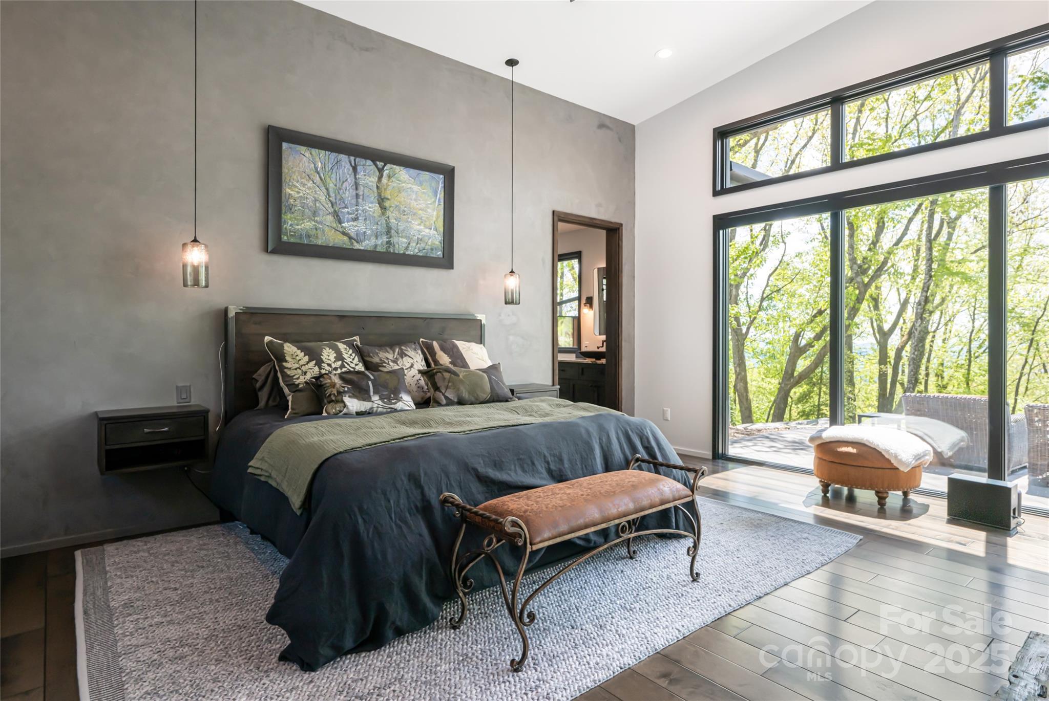 94 Laurel Ledge Way Fletcher, NC 28732 - Photo 28 of 48 a bedroom with a bed and a large window