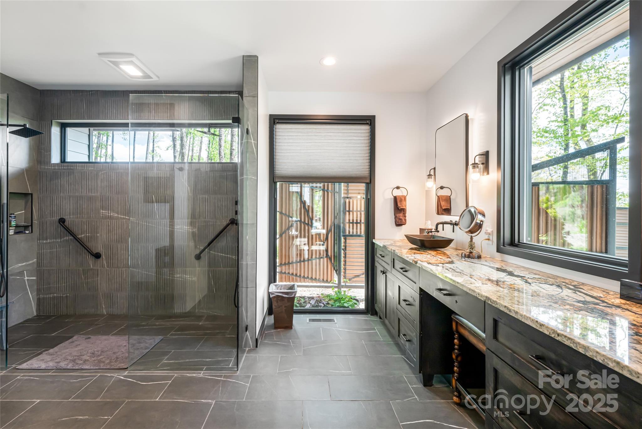 94 Laurel Ledge Way Fletcher, NC 28732 - Photo 30 of 48 a large kitchen with a large window and stainless steel appliances