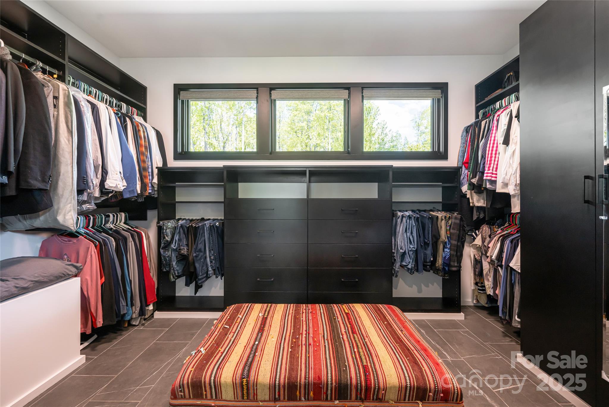 94 Laurel Ledge Way Fletcher, NC 28732 - Photo 32 of 48 a view of walk in closet with clothes and shoes