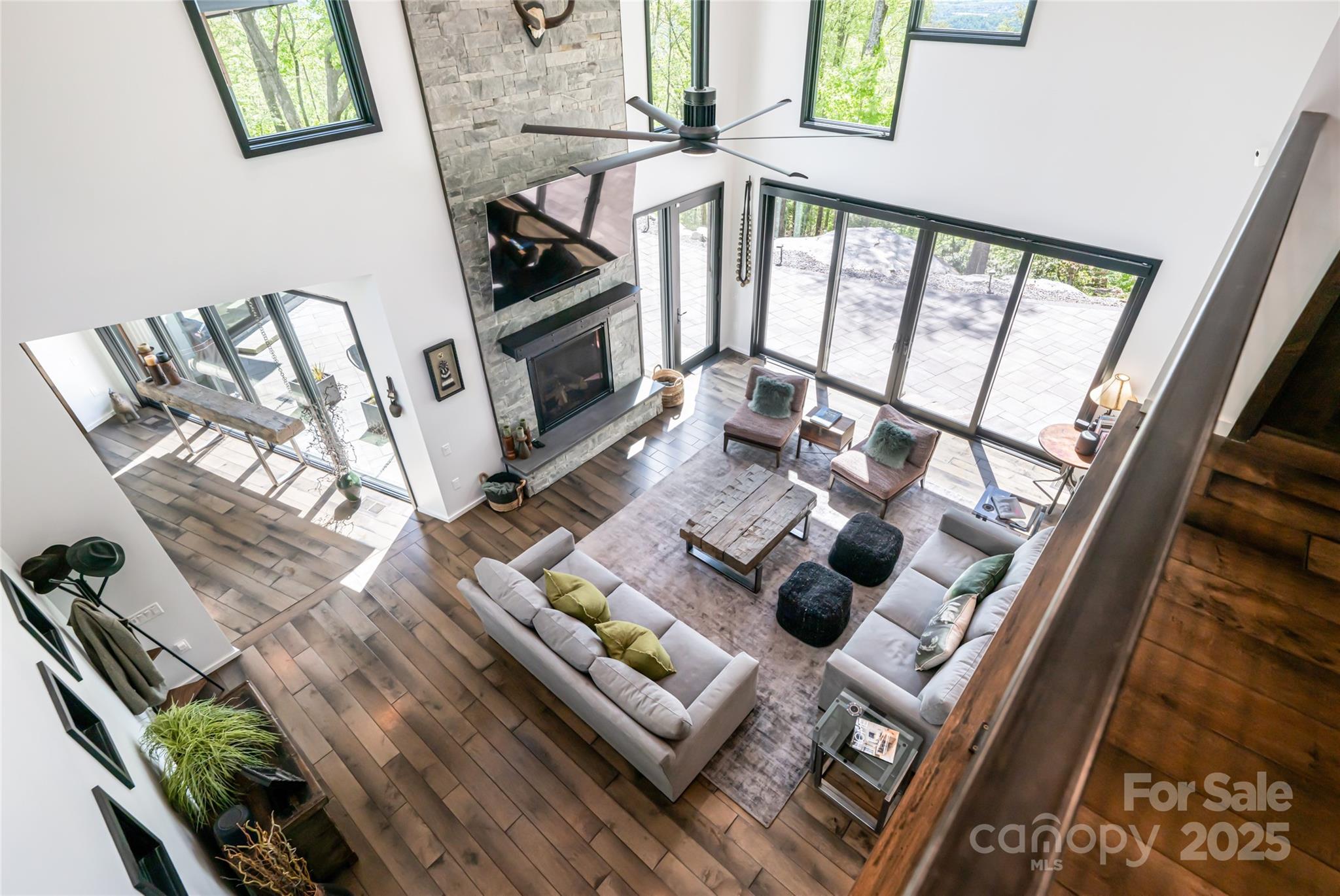 94 Laurel Ledge Way Fletcher, NC 28732 - Photo 35 of 48 a living room with furniture and a fireplace