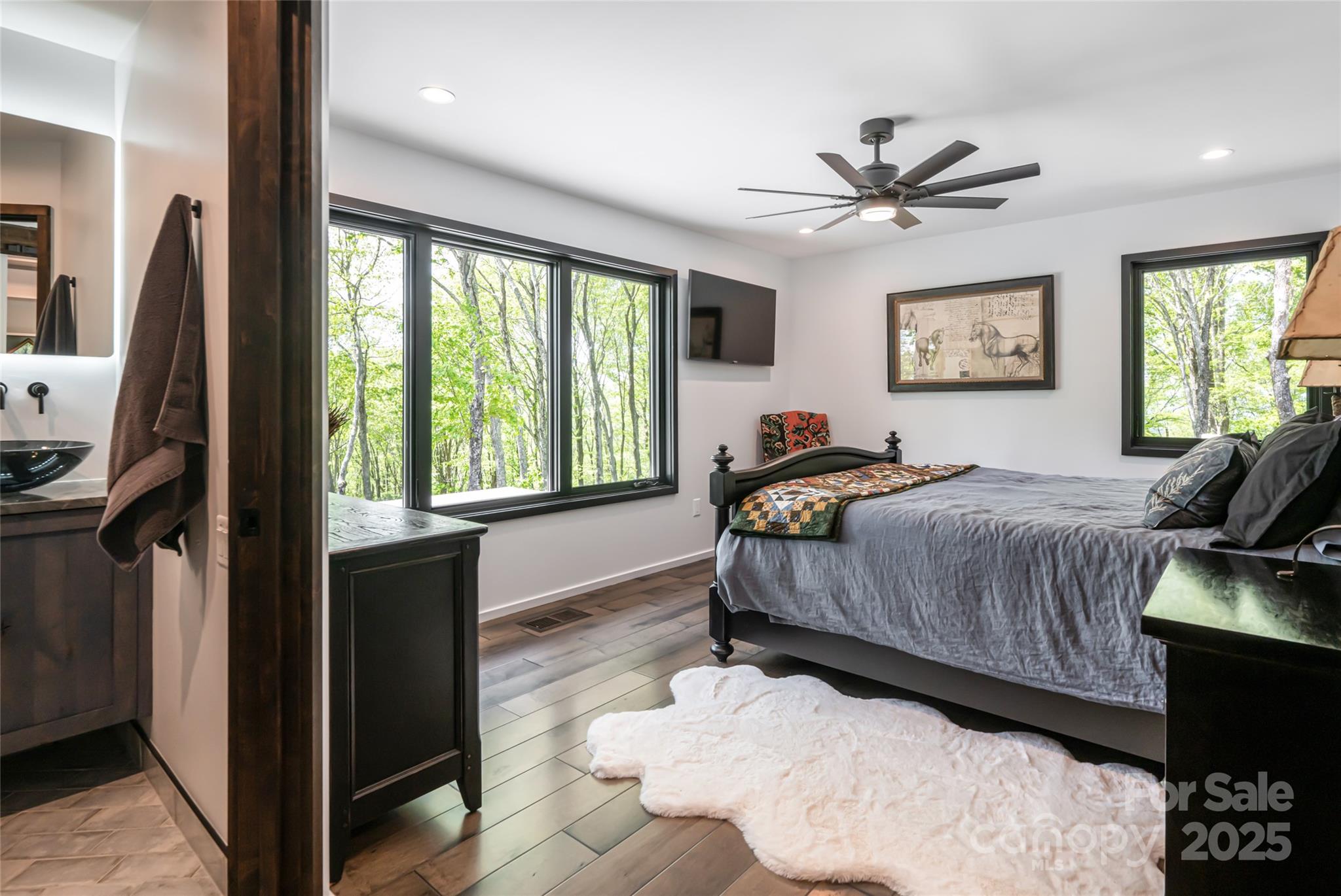 94 Laurel Ledge Way Fletcher, NC 28732 - Photo 36 of 48 a bedroom with a large bed and a window