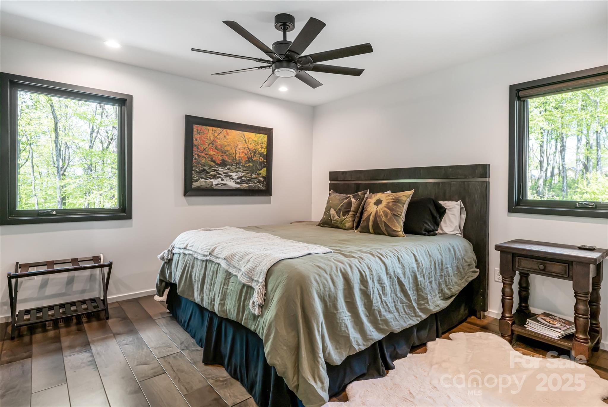 94 Laurel Ledge Way Fletcher, NC 28732 - Photo 38 of 48 a bedroom with a bed and a tv