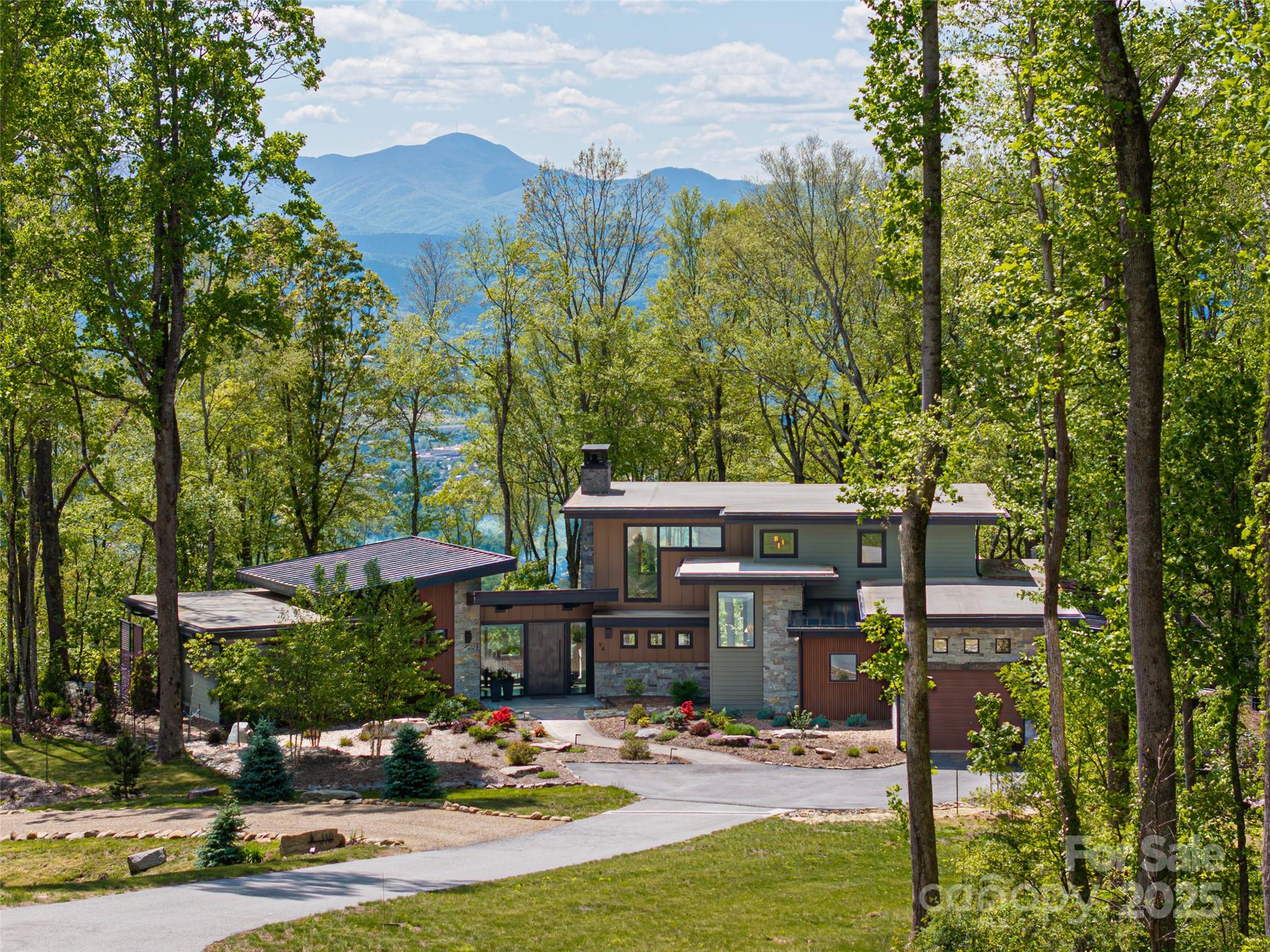 94 Laurel Ledge Way Fletcher, NC 28732 - Photo 43 of 48 a front view of a house with yard patio and swimming pool